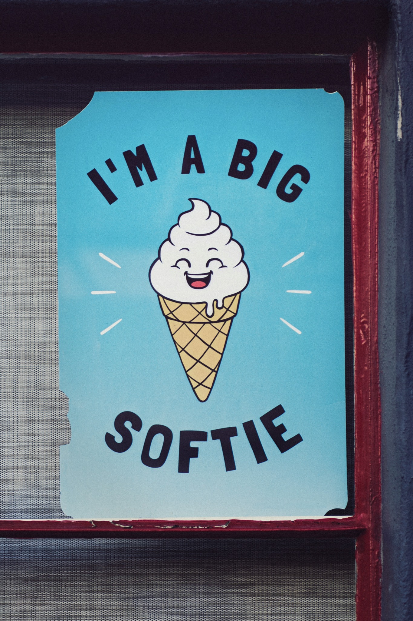 A printed promotional sign with bold illustrated graphics, demonstrating display printing.