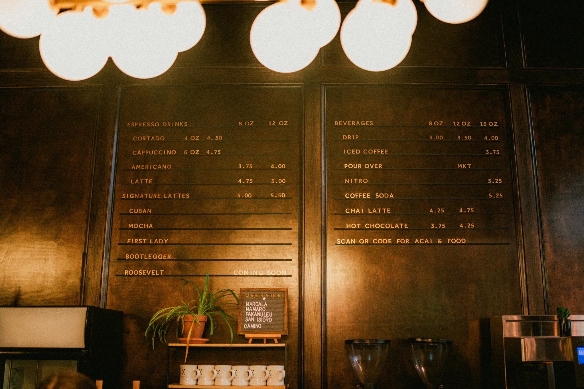 Commercial menu signage installed in a hospitality interior, demonstrating customer-facing signage.